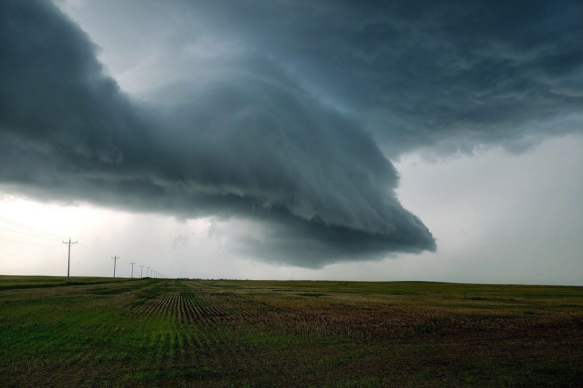 a storm front moves over plains