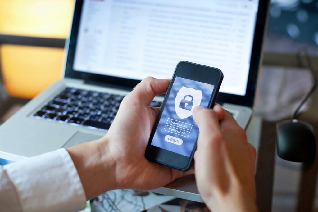 a person logging into an account with multifactor authentication - home internet safety tips