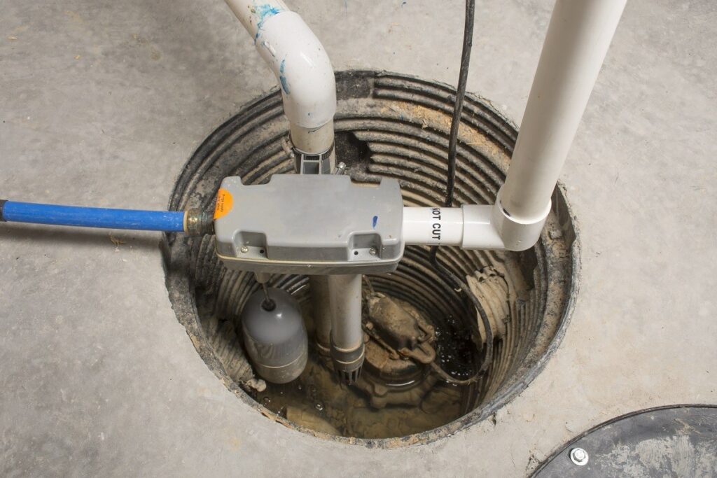 close up on a sump pump in a concrete floor