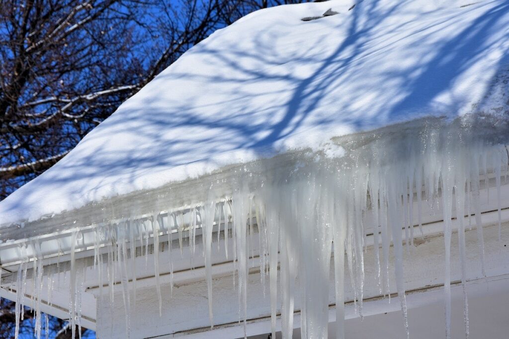 Icicles forming on a roof